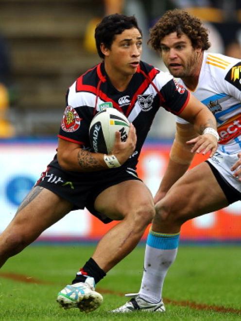 Kevin Locke of the Warriors makes a run against the Gold Coast Titans before his injury.  (Photo...