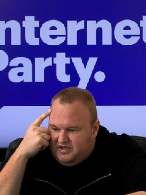 Kim Dotcom says at least one sitting MP has signed up as a member of his new party, but he won't...