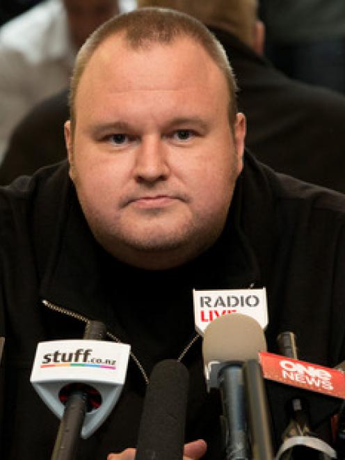 Kim Dotcom wants to sit down with John Banks to determine who is telling the truth. Photo / NZ...