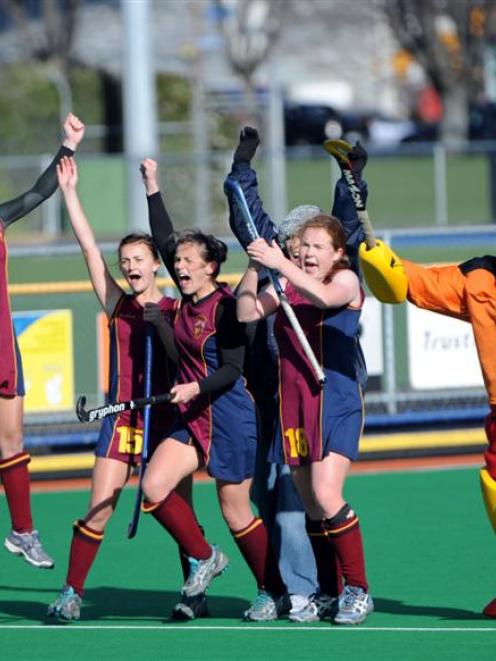 King's College celebrates its dramatic 5-4 win against Otago Girls' High School in the final of...