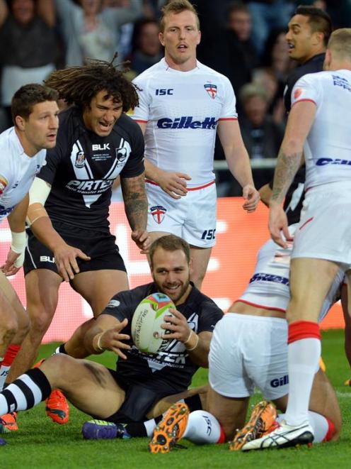 Kiwis wing Jason Nightingale grins after scoring New Zealand's first try. Photo by Peter McIntosh.
