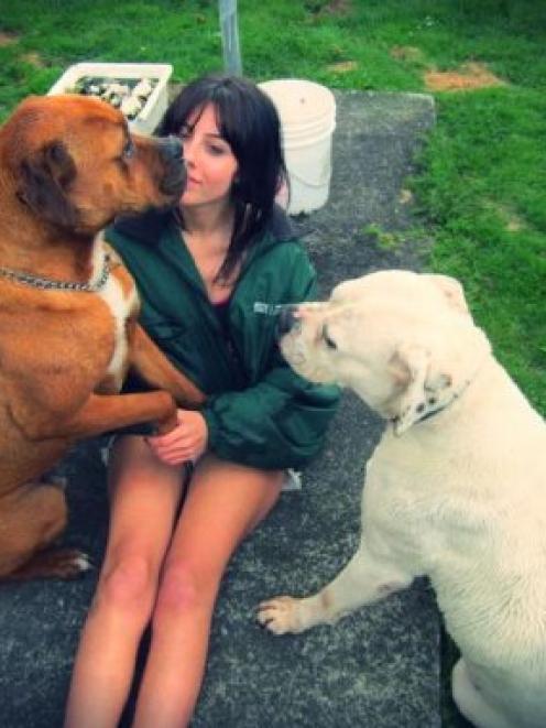Kora Neubusch with her dogs Fish and Chips. Chips could be put down after biting a man who came...