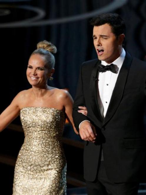 Kristin Chenoweth and Oscars host Seth MacFarlane perform the closing number at the 85th Academy...