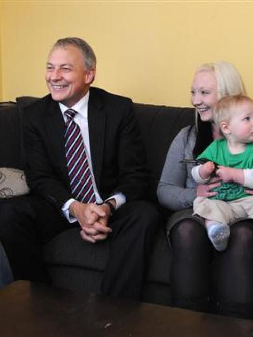 Labour leader Phil Goff (centre) with members of the Campbell family, from left, Jesse-James (2),...