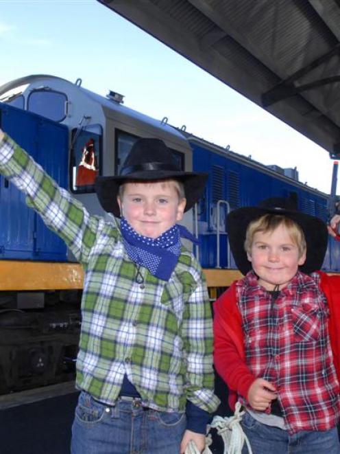 Lachlan (7) and Josh Cronin (5), of Tapanui, celebrate after a ride on the Cadbury Crunchie Gold...