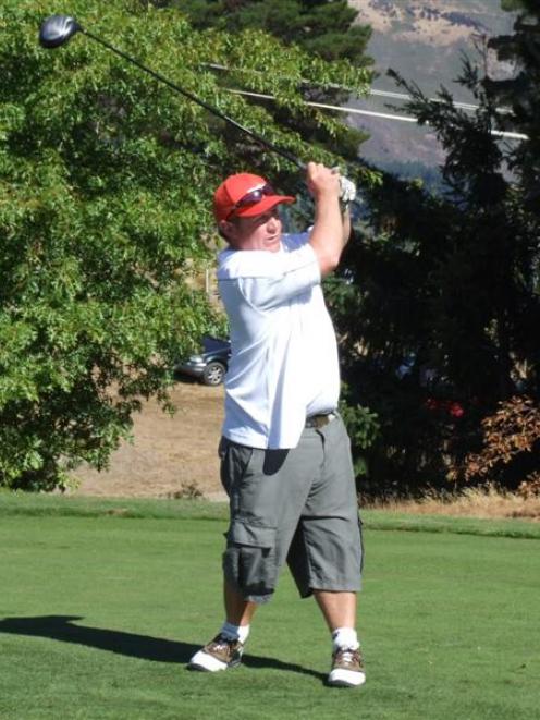 Lake Hawea golfer Rick Johnston plays a shot during the Wanaka Charity Golf Classic, an event...