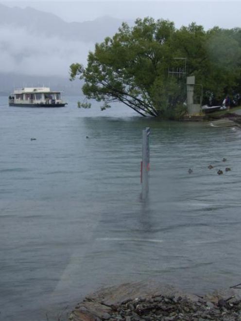 Lake Wanaka's Lady Pembroke houseboat returns to shore yesterday but is unable to berth at the...
