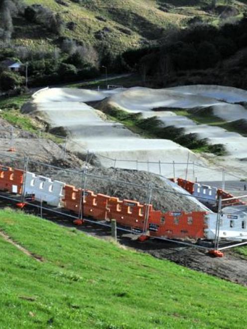 Land beside Dunedin's Forrester Park BMX track has been fenced off after material containing...