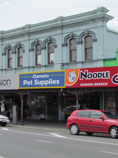 Land owned by the Waitaki District Council under these four Thames St shops in the central...