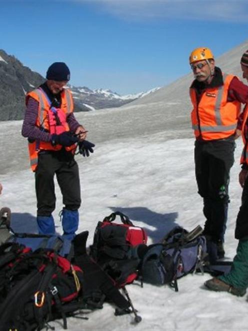 LandSAR members Emma Fleming, John Taylor, Rod Walker and Alan Gillespie prepare to search for a...