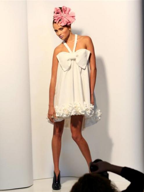 Larisa, of Clyne Model Agency, models a dress made from toilet paper which was designed by...