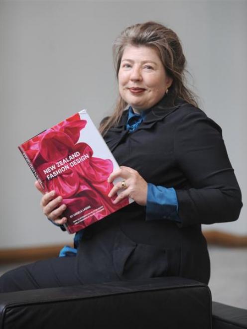 Lassig with her new book. Photo by Peter McIntosh.