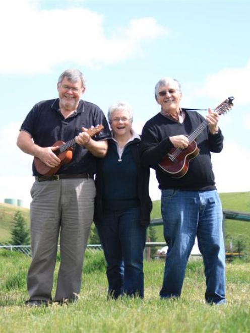 Lauder Ukulele Festival organisers (from left) Bruce and Esme Macdonald, and Barry Bemrose tune...
