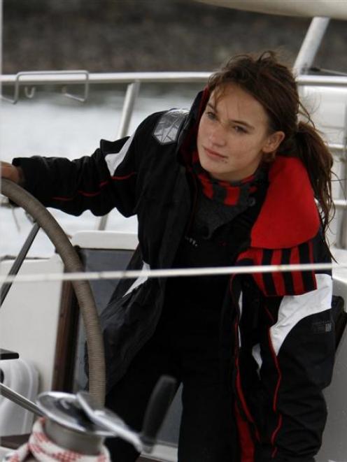 Laura Dekker arrives at Marsden Cove aboard her yacht Guppy.