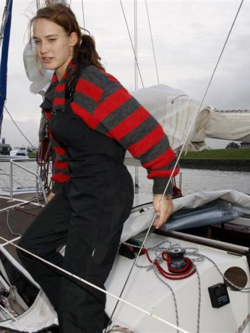Laura Dekker at Marsden Cove aboard her yacht <i>Guppy</i>. Photos from Northern Advocate.