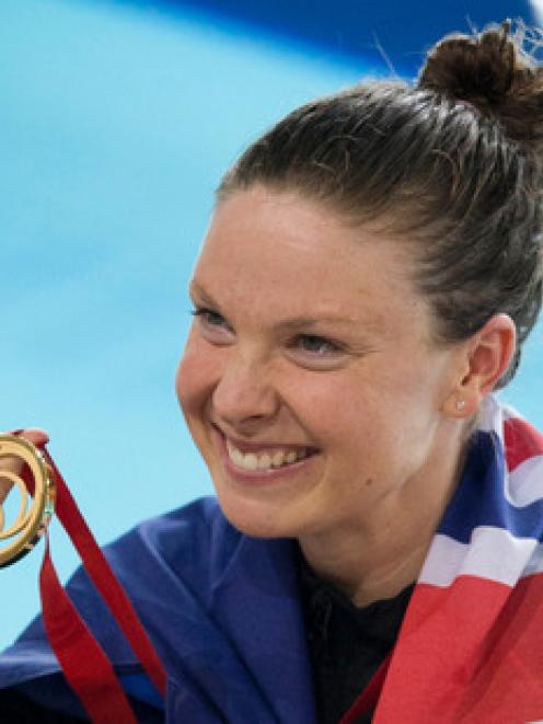 Lauren Boyle celebrates after winning gold in the women's 400m freestyle event this morning....
