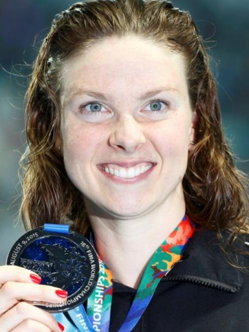 Lauren Boyle shows off her silver medal after the women's 800m freestyle final at the Aquatics...