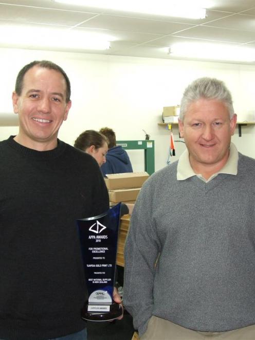 Lawrence company Tuapeka Gold Print business partners Brad Houghton (left) and Jim Robertson show...