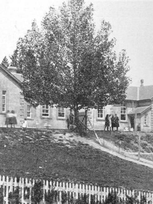 Lawrence District High School, showing part of the school garden on the terrace. - Otago Witness,...