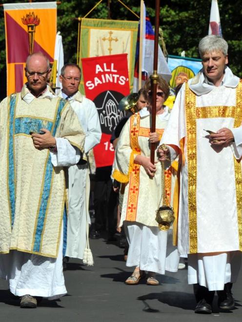 Leading a procession marking 150 years since the laying of the foundation stone at Dunedin's All ...