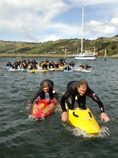 Leading the way during a Surf Life Saving Otago training camp paddling technique lesson at the...