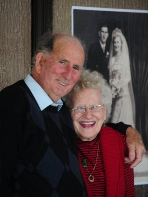 Les and Eunice Preston celebrate their diamond anniversary in front of their 1951 wedding...