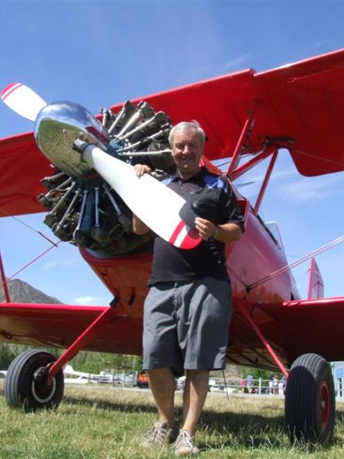 Les Lamb stands beside the biplane which has been creating plenty of interest at the Omarama...