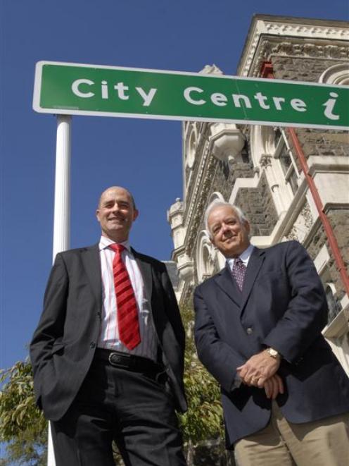 Let there be power . . . Genesis Energy retail manager Dean Carroll (left) and chief executive...
