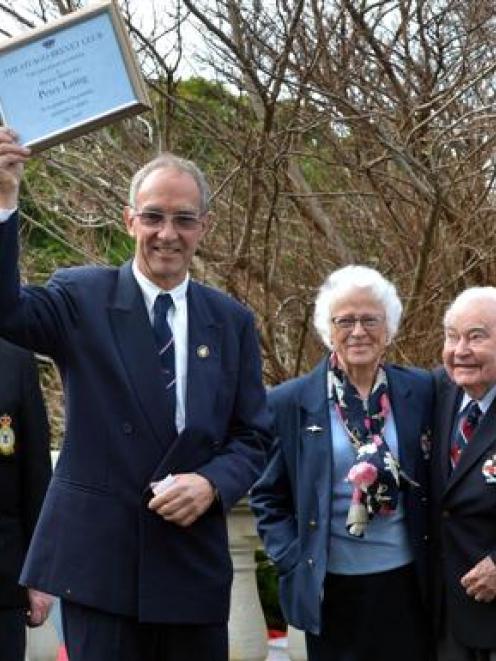 Leviathan Hotel publican Peter Laing (centre) after being presented with honorary membership by...