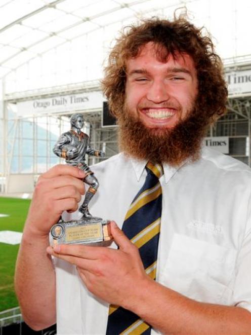 Liam Coltman (22)  with his player of the year trophy at the Forsyth Barr Stadium yesterday....