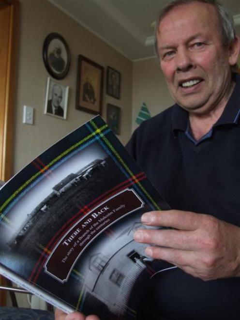 Lindsay Malcolm with his latest book 'There And Back'. Photo by Sally Rae.