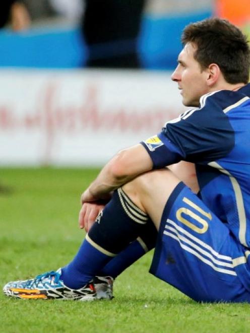 Lionel Messi reacts after Argentina's World Cup final loss to Germany. REUTERS/Sergio Moraes