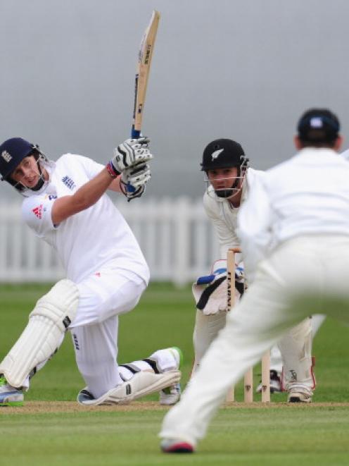 Lions captain Joe Root hits out against New Zealand on day two of their match at Grace Road in...