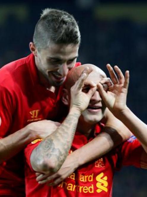 Liverpool's Jonjo Shelvey celebrates with a teammate after scoring against BSC Young Boys (YB)...