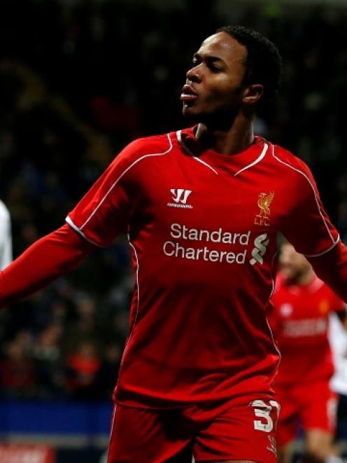 Liverpool's Raheem Sterling celebrates after scoring against Bolton Wanderers at the Macron...