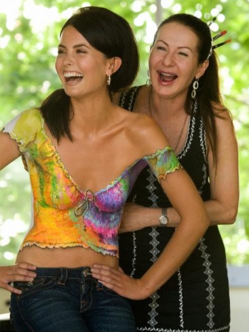 Living canvas . . . Joanne Gair shows off the tie-dyed shirt she painted on model Annelise Burton...