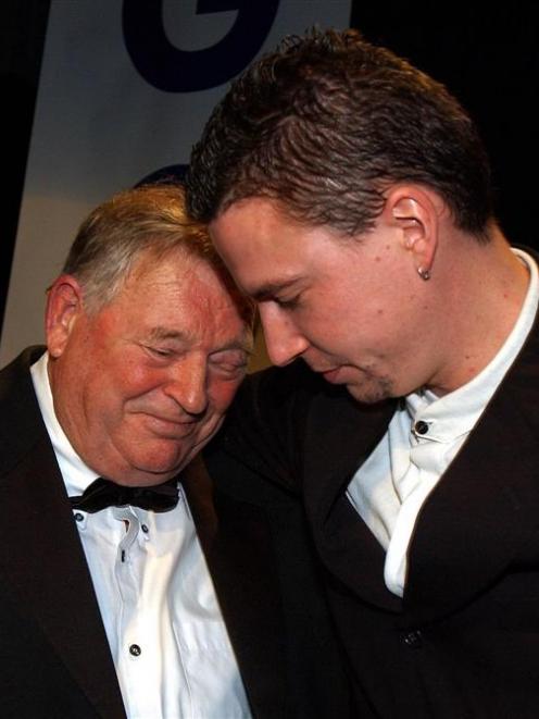 Loader shares a special moment with Duncan Laing during a tribute evening in 2002. Photo by Jane...