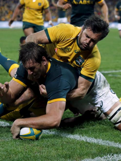 Lock Eben Etzebeth scores for the Springboks in their loss to Wallabies last weekend. Photo by...
