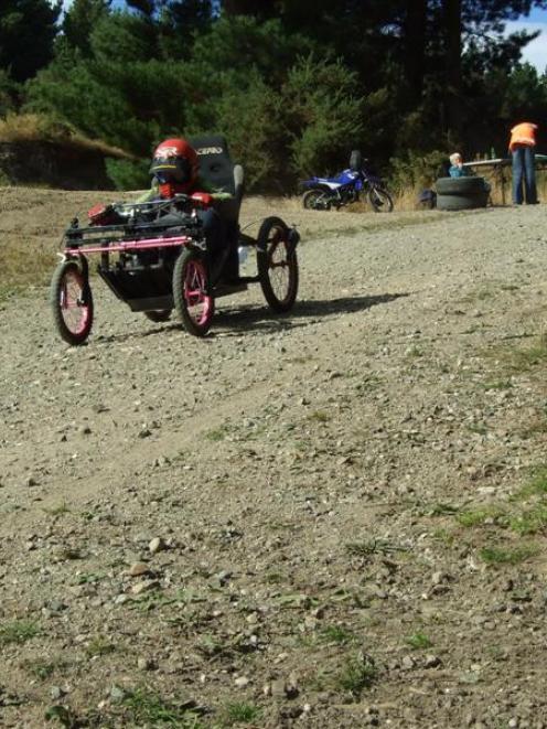 Logan Morrell (11), of Kaitangata, breaks last year's trolley derby speed record on his first run...