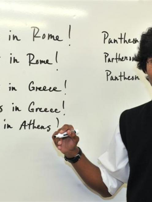 Logan Park High School pupil Tuhin Baucus reminds himself of the difference between Pantheon and...