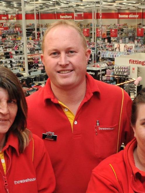 Long-serving  staff members of  The Warehouse (from left) Sharon Giggins, Gareth Michelle and...