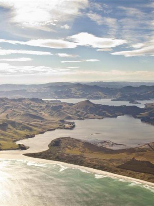 Looking over Allans Beach, with Hoopers Inlet and Harbour Cone centre, Papanui Inlet at right and...