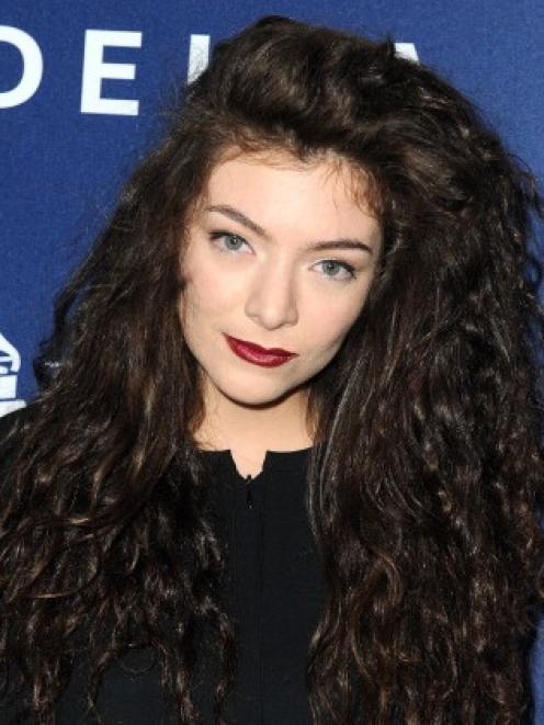Lorde is up for four Grammys.  (Photo by Angela Weiss/Getty Images for Delta Air Lines)