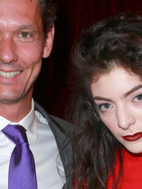 Lorde with Scott Maclachlan in 2013. Maclachlan's company no longer carries a photo of the singer...