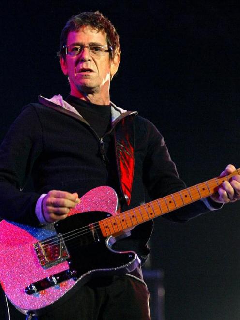 Lou Reed is shown performing in 2004. REUTERS/Miguel Vidal/Files