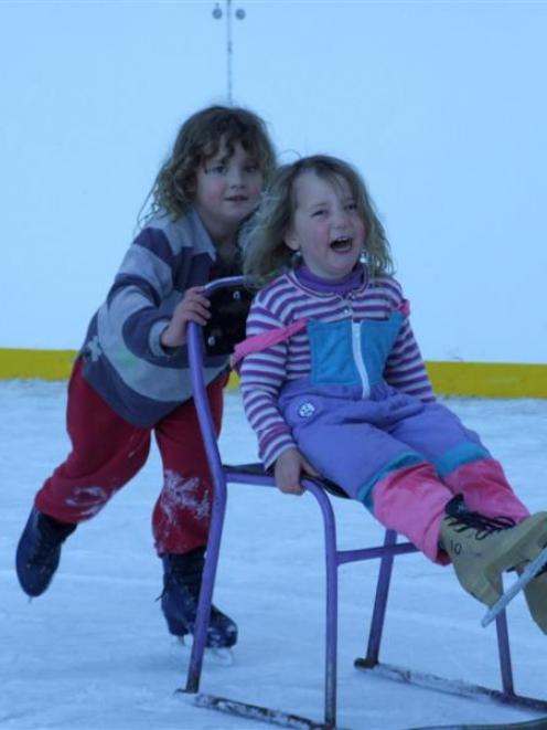 Louis (5) and Ella (4) Farrant, of Palmerston, having fun at the Naseby Ice Festival in 2011....