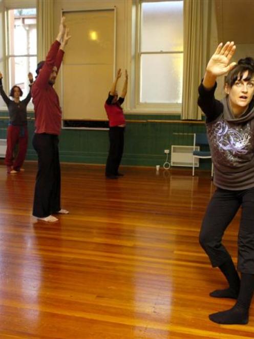 Louise Potiki-Bryant (right) warms up participants at the Oi Dance Workshop at the University of...