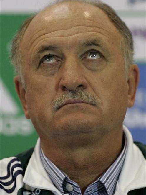 Luiz Felipe Scolari gestures during his presentation as Palmeiras' new soccer coach in Sao Paulo...