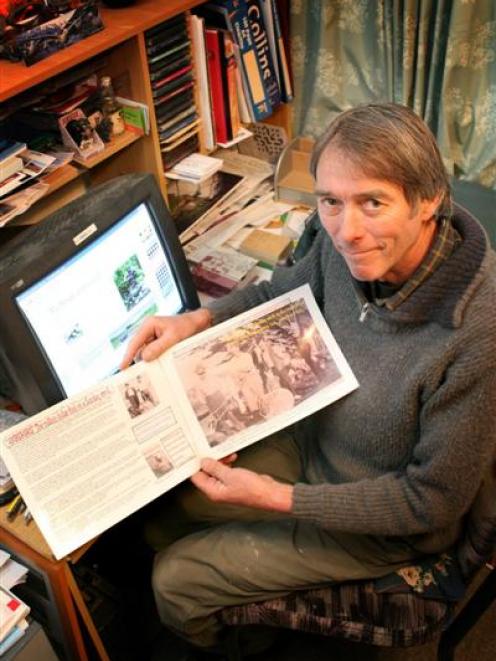 Lyall Smillie, of Queenstown, shows an article he has written about the discovery of an 85kg lump...
