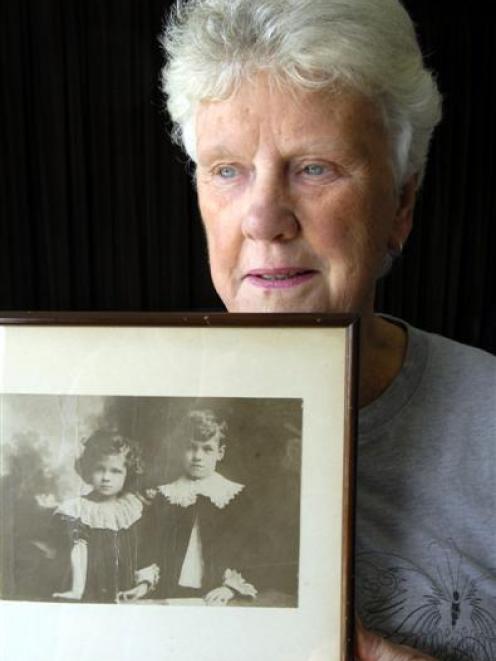 Lynley Mackenzie, of Halfway Bush, with a photo of her father, Harry Ham [left] and her uncle,...